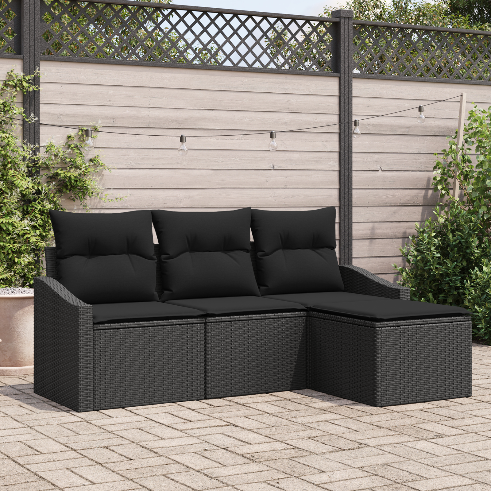 Set Divano da Giardino a 4 Pezzi con Cuscini Nero Rattan Poliestere