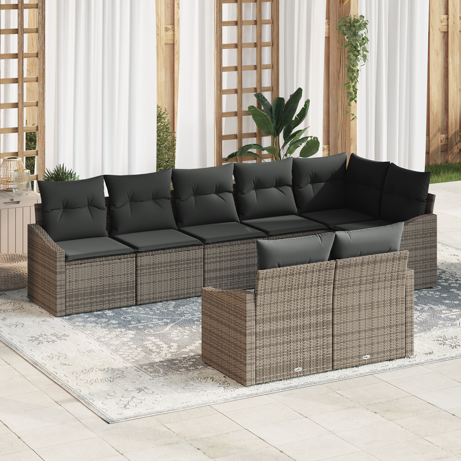Set da giardino a 8 pezzi con cuscini in rattan grigio