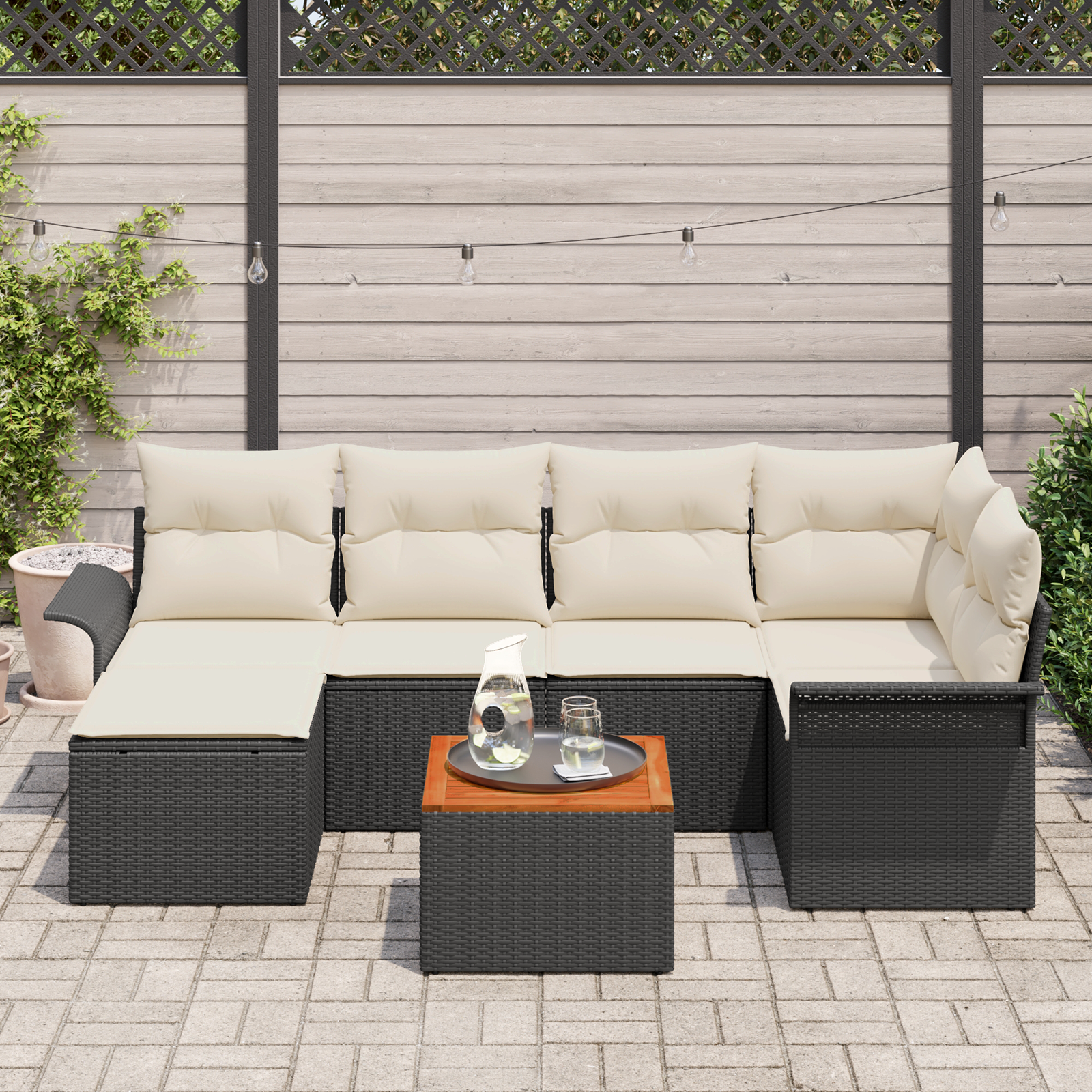 Set di divano da giardino 7 pezzi con cuscini Nero Polyrattan Acacia