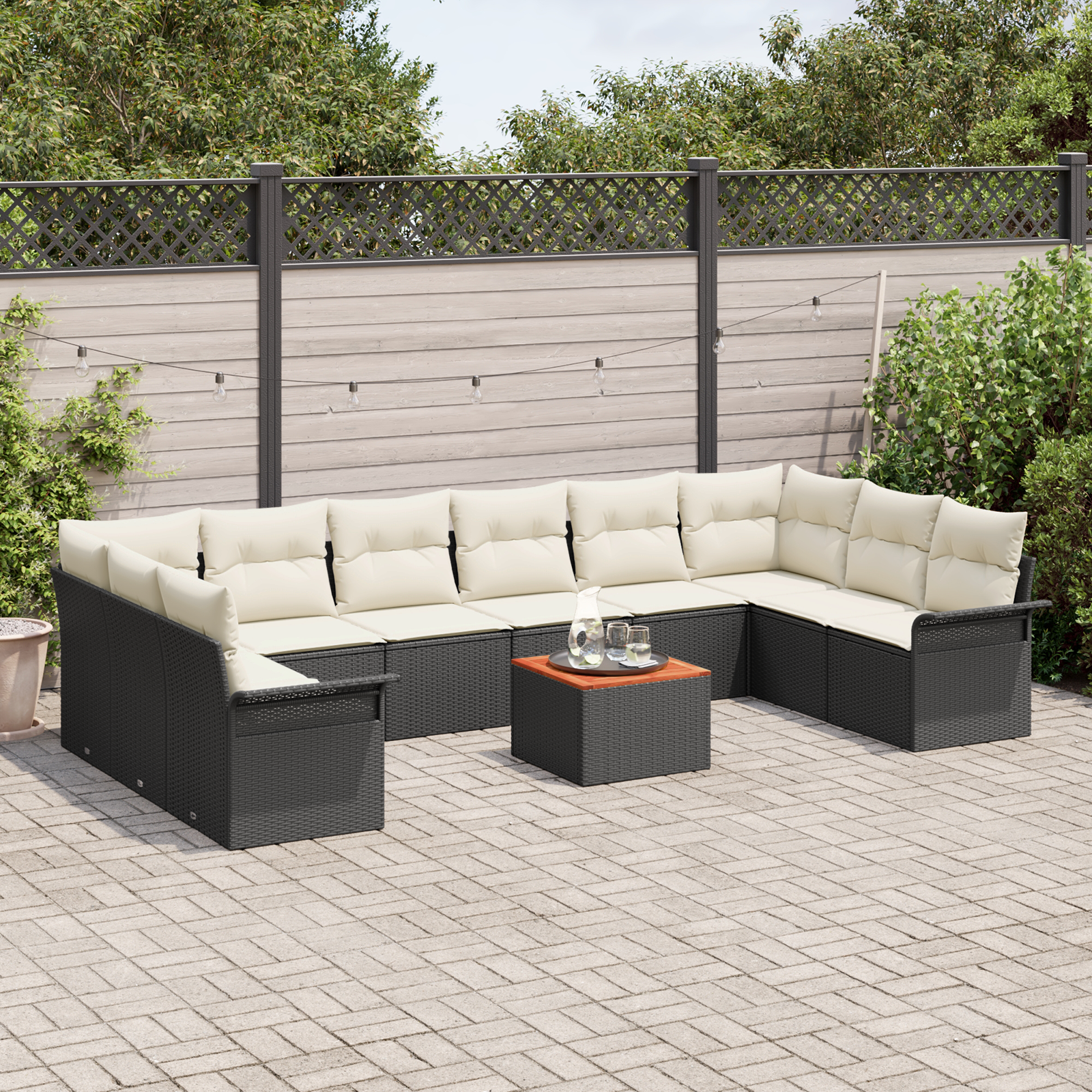 Set di divano da giardino 11 pezzi con cuscini neri in polyrattan di acacia