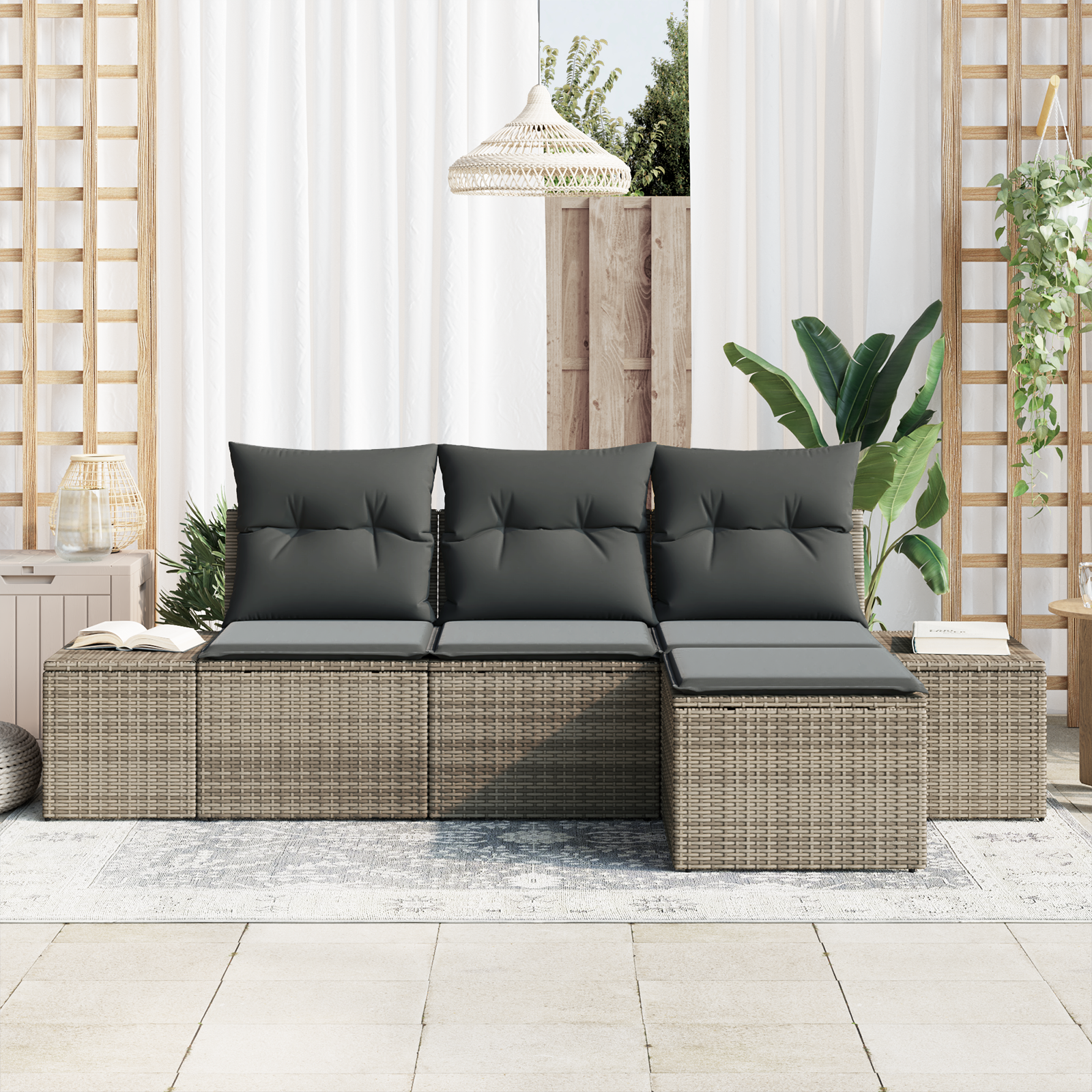 Set di divani da giardino a 4 pezzi con cuscini grigi in poli rattan