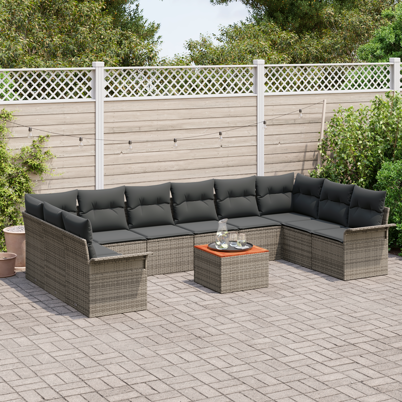 Set Divano da Giardino di 11 Pezzi con Cuscini Grigio Polyrattan Acacia