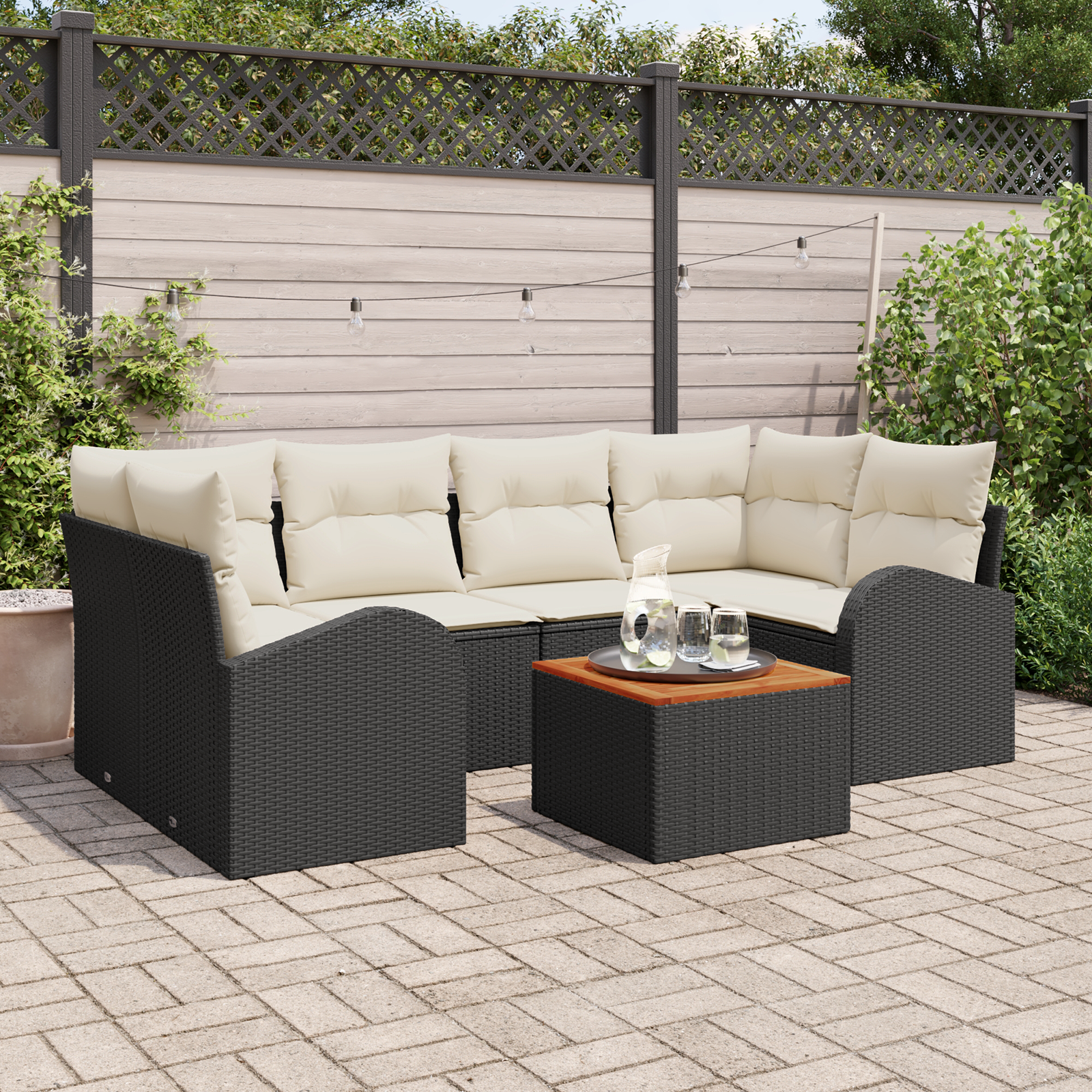 Set Divano da Giardino da 7 Pezzi con Cuscini Rattan Poliestere Nero Acacia