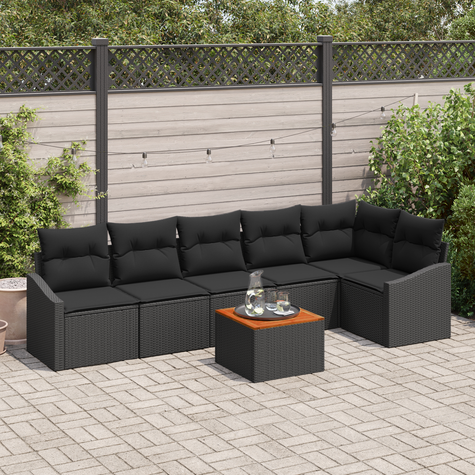 Set Divano da Giardino a 7 Pezzi con Cuscini Nero Rattan Polietilene Acacia