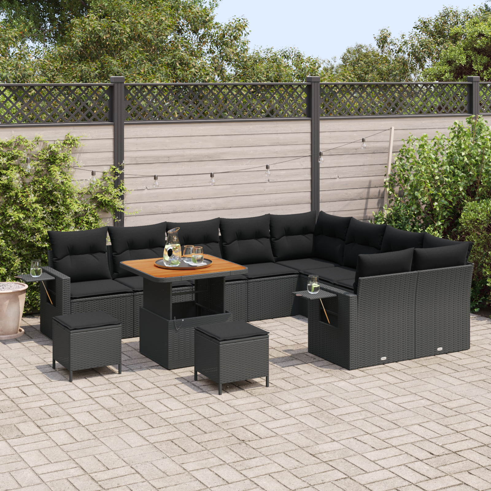 Set di Divano da Giardino da 12 Pezzi con Cuscini Nero Polyrattan Acacia