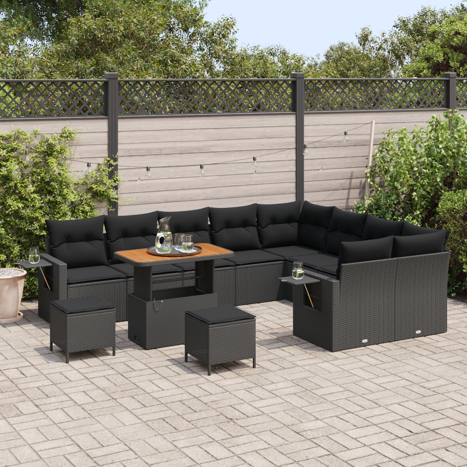 Set di divani da giardino a 12 pezzi con cuscini neri in polyrattan acacia