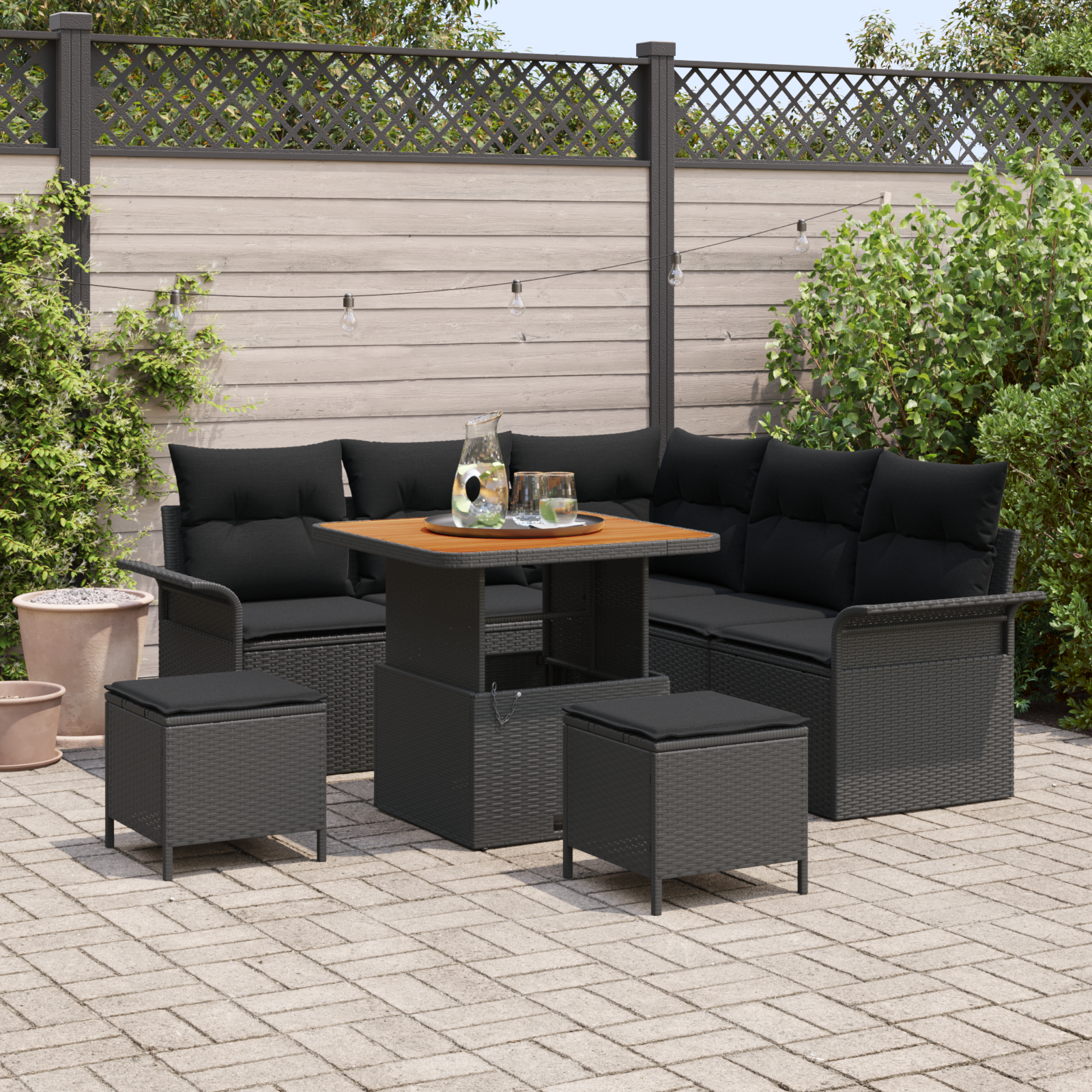 Set di divani da giardino 8 pezzi con cuscini neri in polyrattan e acacia