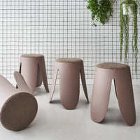 Set di 4 sgabelli impilabili in materiale bouclé, marrone