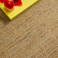 Moquette interna/esterna ad effetto juta chiaro con accenti colorati