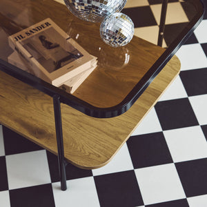 Tavolino vintage in metallo nero con piano in vetro, marrone naturale