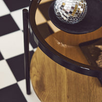 Tavolino rotondo in vetro temperato, legno ed effetto metallo nero,