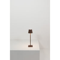Lampada a led da tavolo Poldina Pro Micro Corten ricaricabile e dimmerabile con batteria fino a 12 ore