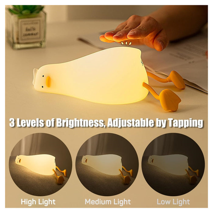 Trade Shop - Luce Notturna Forma Anatra Sdraiata In Silicone Lampada Ricaricabile Usb A Led Touch         