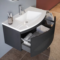 Mobile sospeso 60 cm grigio lucido con un cassetto e lavabo in ceramica, frontale curvo | Lula