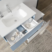 Mobile bagno sospeso 60 cm blu pastello con lavabo e cassettone bianco opaco | Darwin