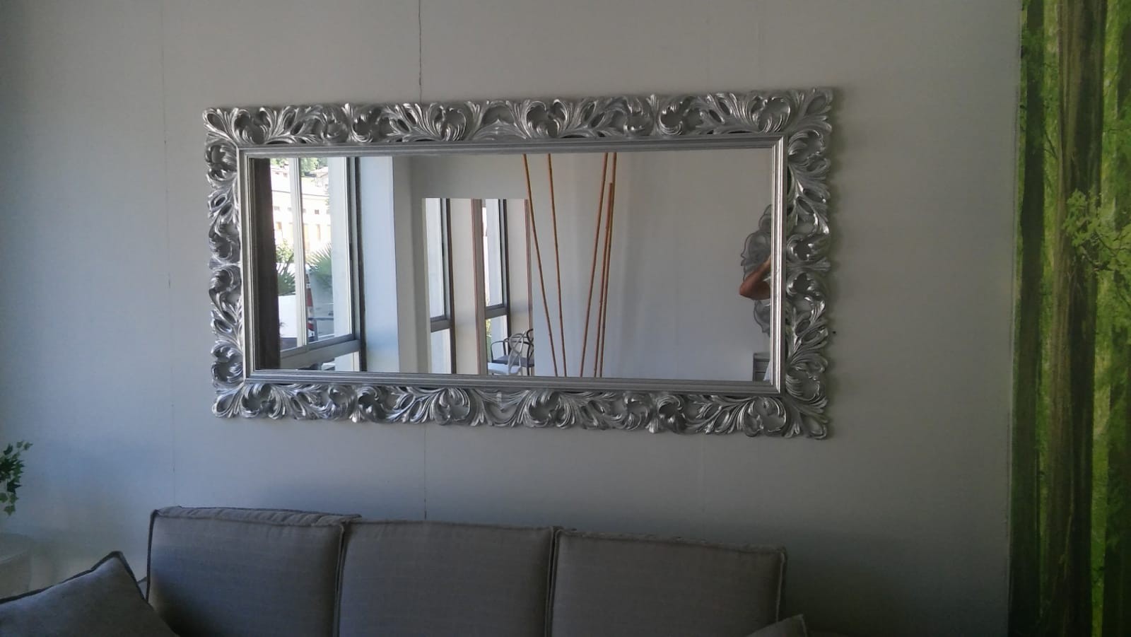 Specchiera barocca intagliata in foglia argento l.107xp.5 h.207 argento