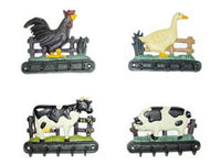 ganci appenditutto in ghisa decorati - in set da pz.4 decoro: gallo, maiale, mucca, oca cod:ferx.fer22262
