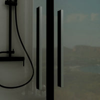 Porta doccia 70cm apertura saloon con profili nero opaco e vetro da 6mm fumè h195 | Elba