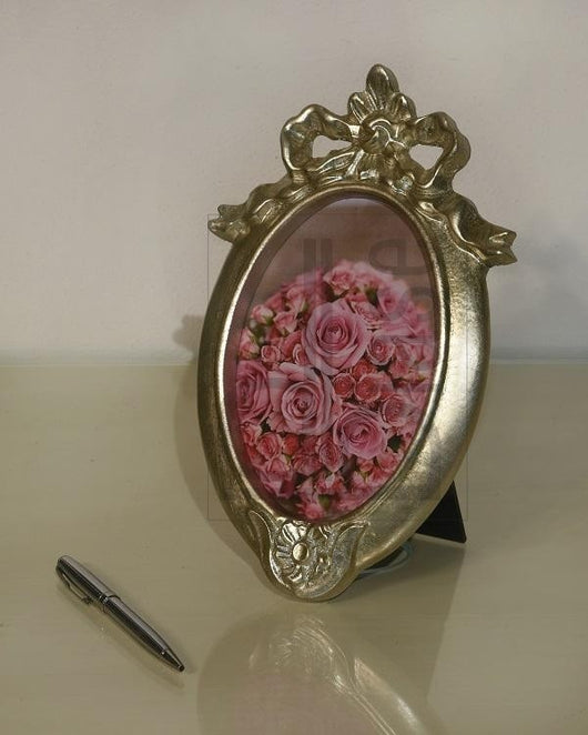 Mobili2g - portafoto in foglia argento ovale - misure: l.23 x h.33 x p.2