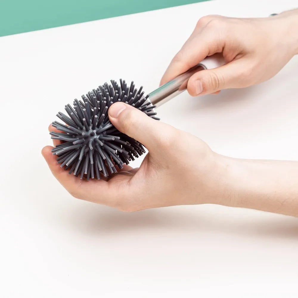 Portascopino da appoggio bianco e grigio con setole in silicone