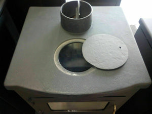 Stufa a legna con caldaia integrata. Top in ghisa. Potenza di riscaldamento 8 + 4Kw