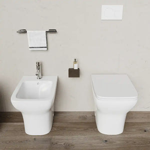 Coppia di sanitari filomuro rimless in ceramica bianca: vaso bidet e copriwc soft-close | Havana