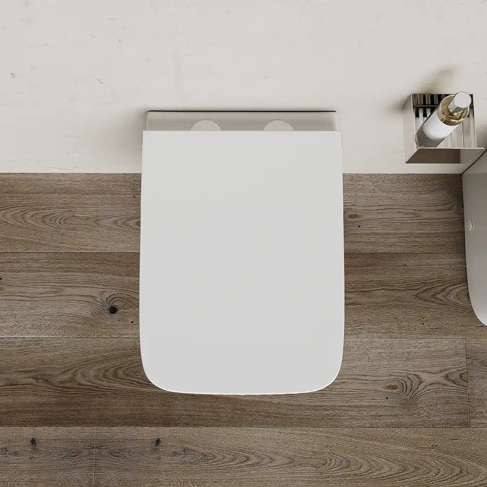 Coppia di sanitari filomuro rimless in ceramica bianca: vaso bidet e copriwc soft-close | Havana