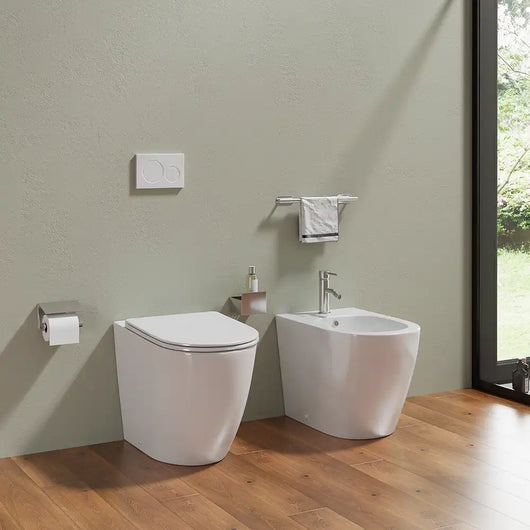 Sanitari filomuro in ceramica bianco lucido vaso rimless con copriwc soft-close e bidet | Europa