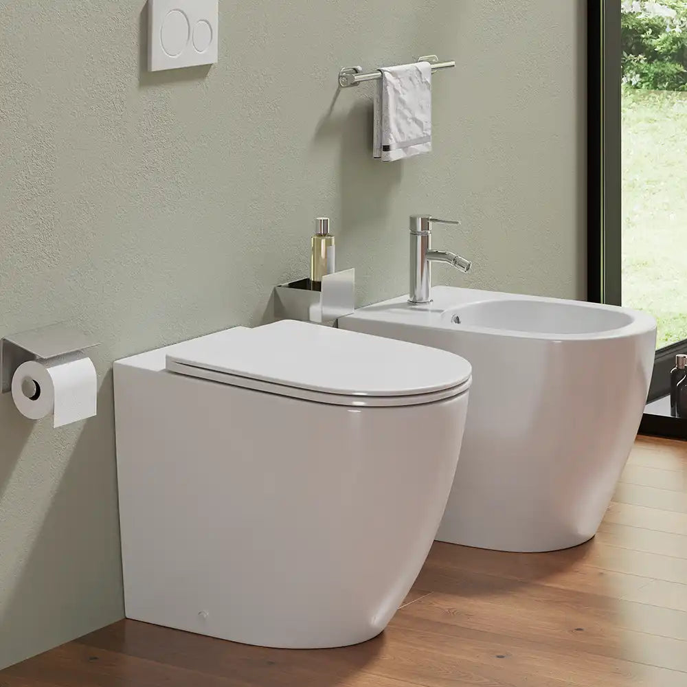 Sanitari filomuro in ceramica bianco lucido vaso rimless con copriwc soft-close e bidet | Europa
