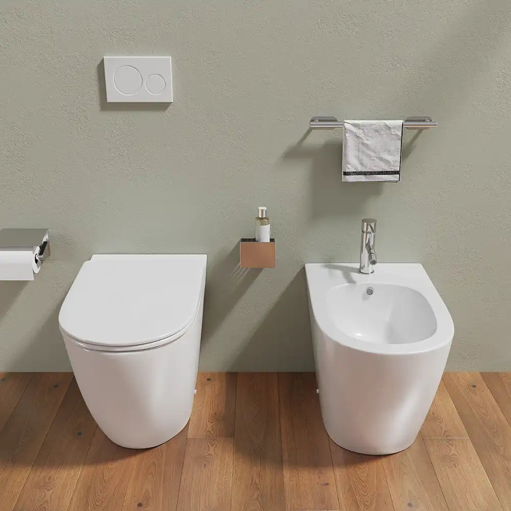 Sanitari filomuro in ceramica bianco lucido vaso rimless con copriwc soft-close e bidet | Europa