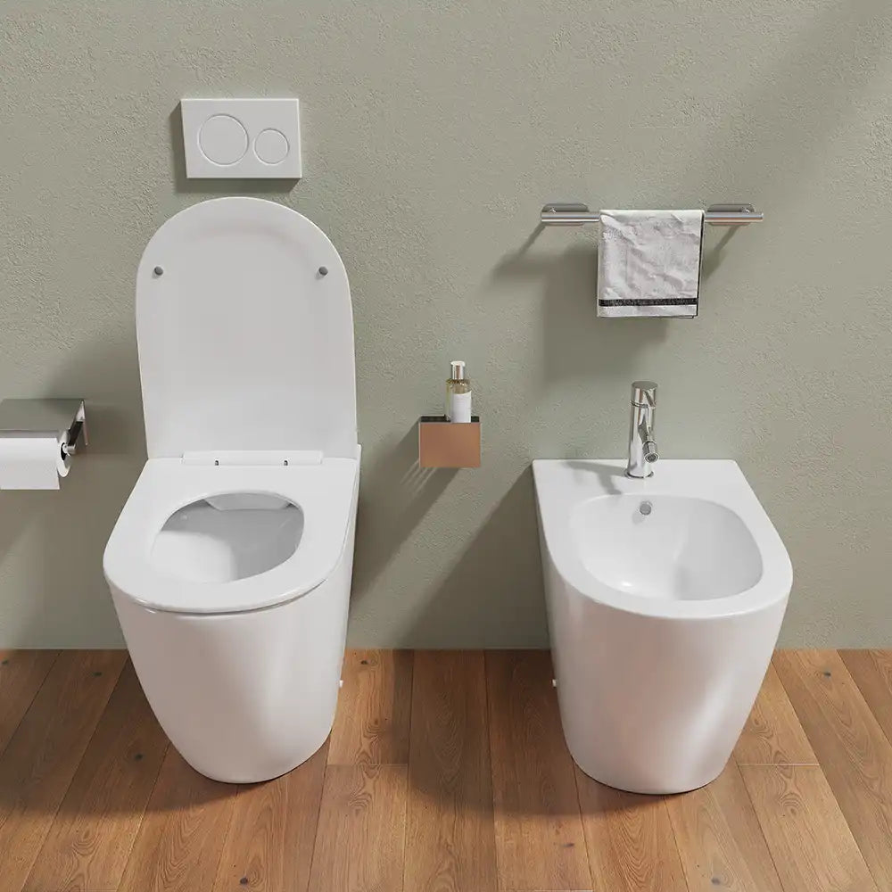Sanitari filomuro in ceramica bianco lucido vaso rimless con copriwc soft-close e bidet | Europa