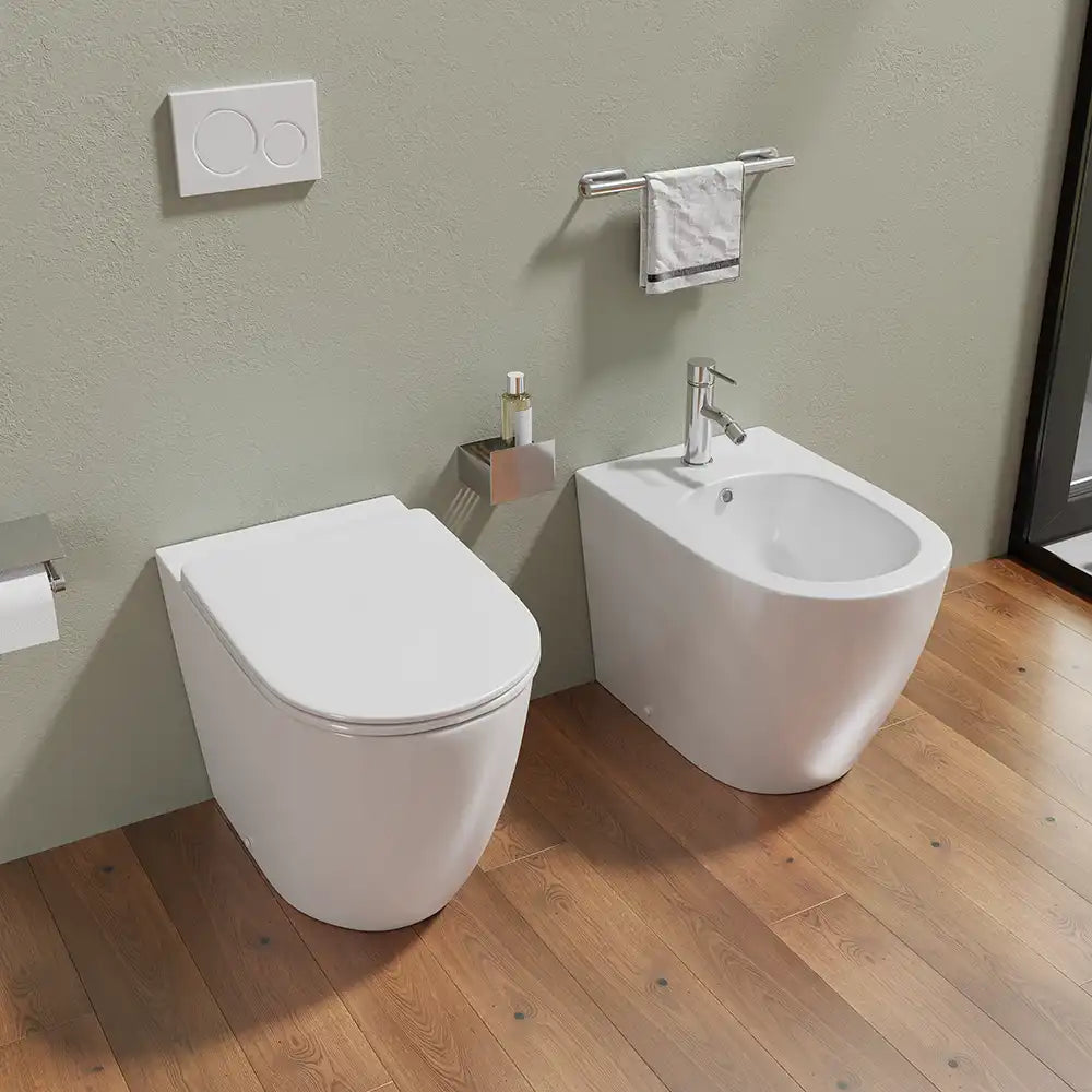 Sanitari filomuro in ceramica bianco lucido vaso rimless con copriwc soft-close e bidet | Europa