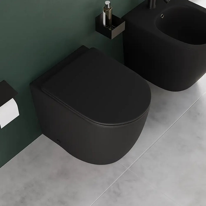 Coppia di sanitari filomuro ceramica nero opaco vaso rimless copriwc soft-close e bidet | Europa Small