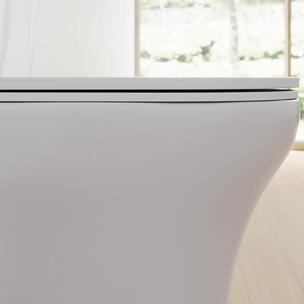 Vaso filomuro rimless in ceramica bianco lucido con sedile soft-close | Nassau