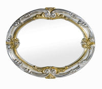 Specchiera in foglia argento ovale con particolari mecca- misure: 84 x 104 x 5