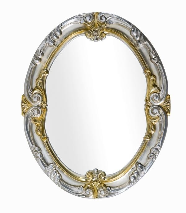 Specchiera in foglia argento ovale con particolari mecca- misure: 84 x 104 x 5