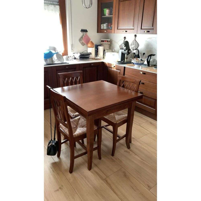 Tavolo classico allungabile a libro fino 200 cm in legno massello e mdf con rifinitura in noce  100x100x78 H