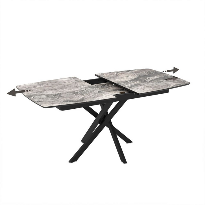 Tavolo allungabile Filis con piano effetto marmo arabesque nero lucido e gambe in metallo nero