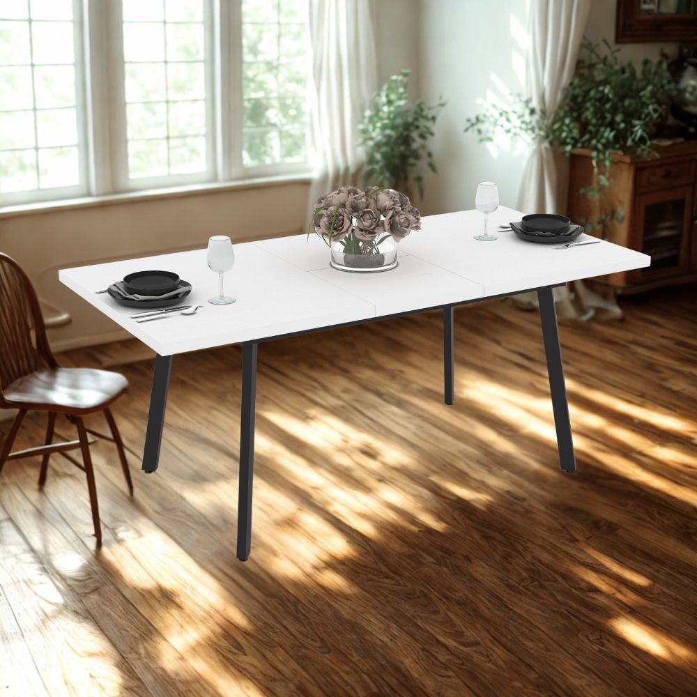 Tavolo allungabile Lini piano bianco frassinato e gambe in metallo nero 138x85x76h
