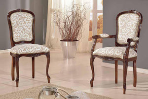 Capotavola imbottita in legno massello intagliata con fregi