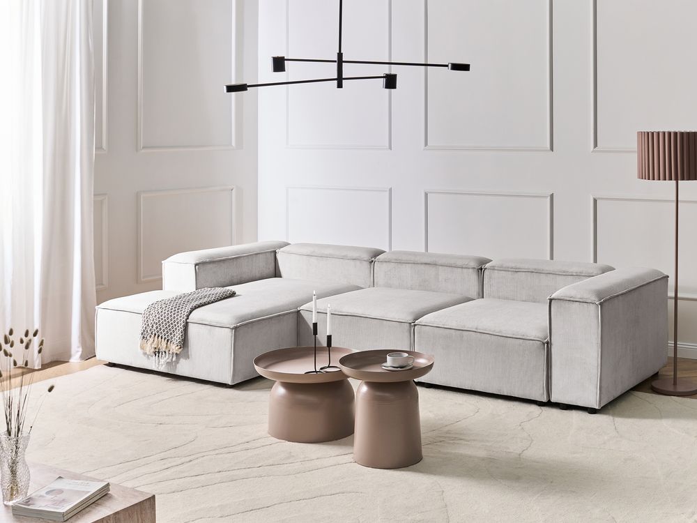 Divano componibile a 4 posti con gambe nere in velluto a coste bianco sporco lato destro Soggiorno moderno