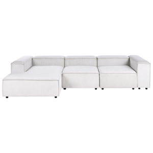 Divano componibile a 4 posti con gambe nere in velluto a coste bianco sporco lato destro Soggiorno moderno