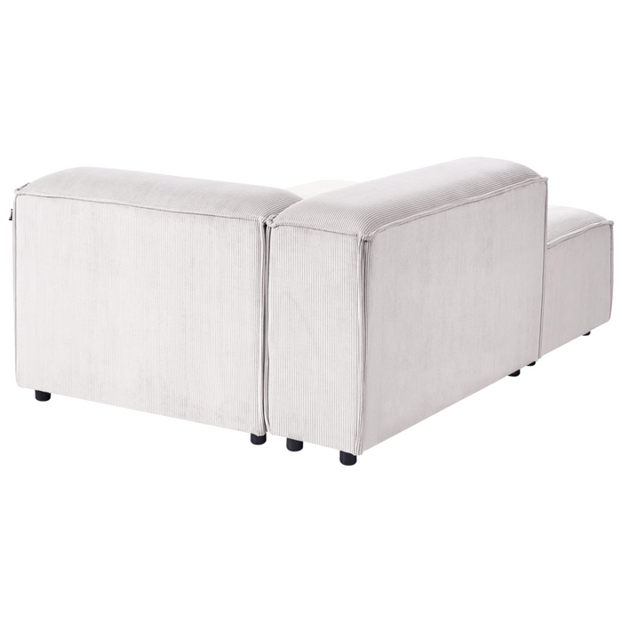 Divano componibile a 4 posti con gambe nere in velluto a coste bianco sporco lato destro Soggiorno moderno