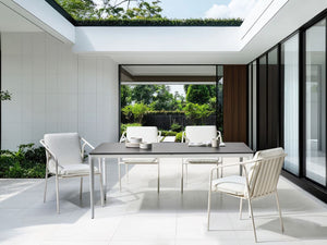 Tavolo da pranzo da giardino Piano in HPL grigio scuro Telaio in alluminio bianco Resistente ai raggi UV all'acqua e alla ruggine Stile moderno del patio esterno