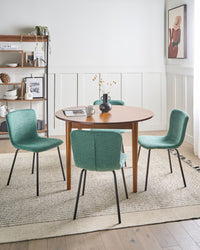 Set di 4 sedie da pranzo in tessuto Tappezzeria verde Gambe in metallo nero Design moderno e retrò