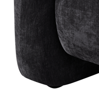 Poltrona in velluto tessuto nero con cuscino rotondo stile glamour retrò soggiorno