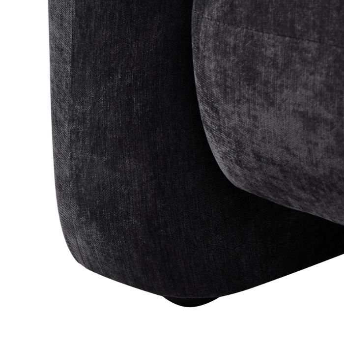 Poltrona in velluto tessuto nero con cuscino rotondo stile glamour retrò soggiorno