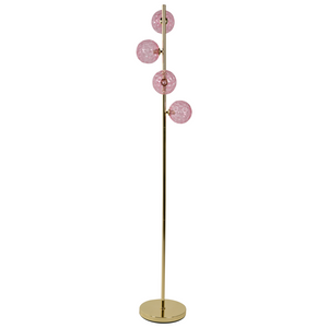 Lampada da terra in vetro beige con base in metallo rosa. Illuminazione per soggiorno dal look moderno e affascinante.