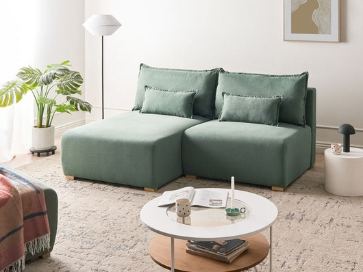Divano componibile in tessuto verde chiaro imbottito con funzione letto e contenitore lato destro Stile minimalista