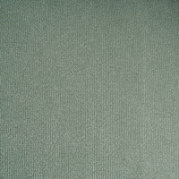 Divano a 2 posti tessuto verde chiaro elementi morbidi neri stile moderno soggiorno